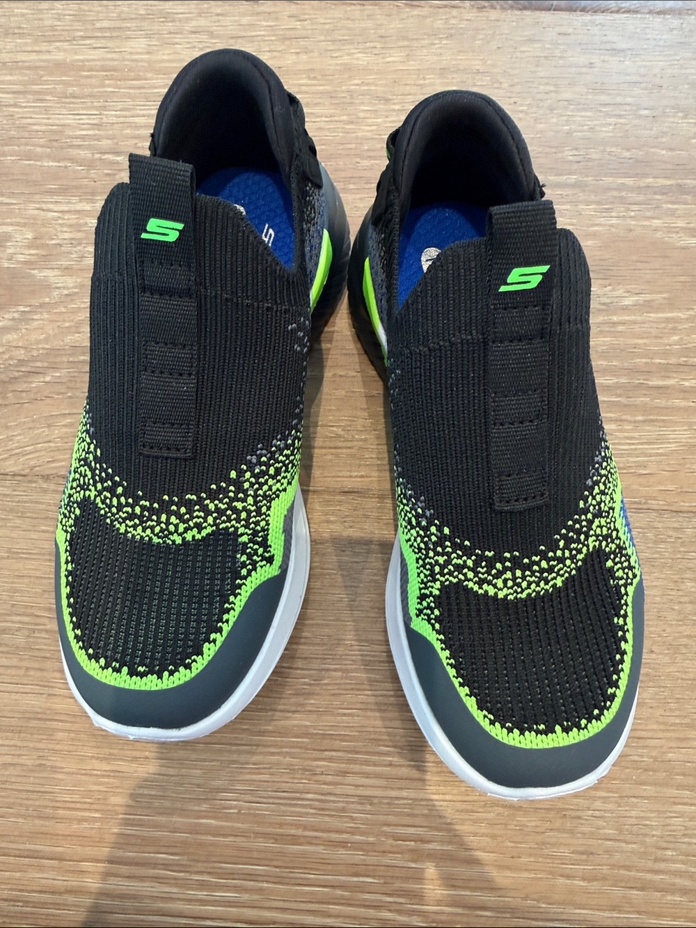Skechers Kids Slip-On Sneakers in Black and Neon Green Knit